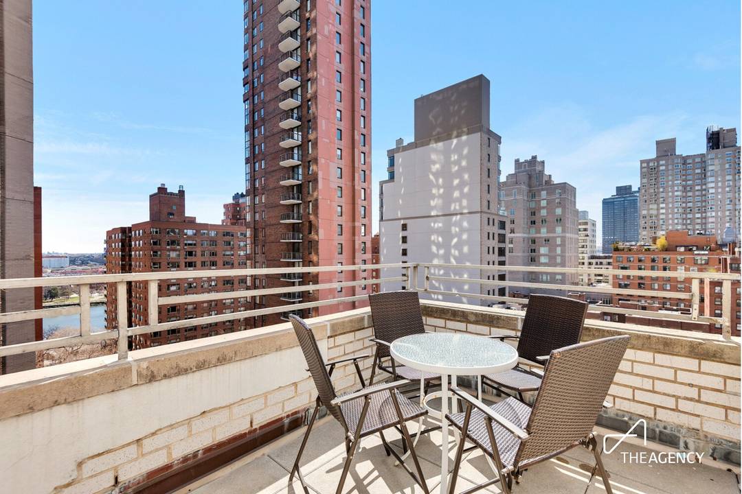 Elevated city living on the Upper East Side, Penthouse C at 525 East 82nd Street is a sun filled NYC top floor apartment featuring two private terraces, dazzling city views, ...