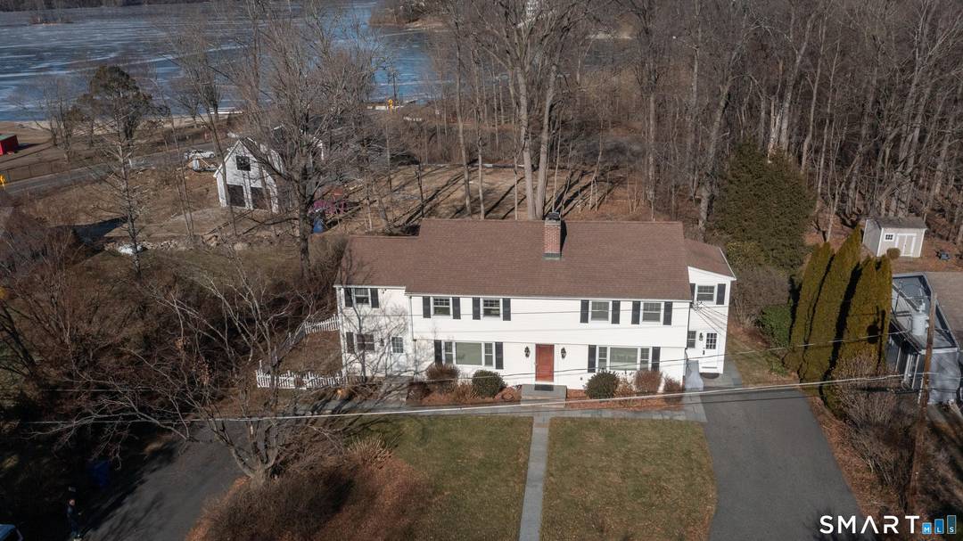 Rare opportunity to own a perfectly updated two family home just steps to Candlewood Lake !