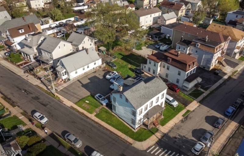 Legal Three Family Home. This property is sitting on a lot size of 5000 SQF Lot, Offers Comfortable living space and Great income potential, near everything, Schools, Trinitas Hospital, Train ...