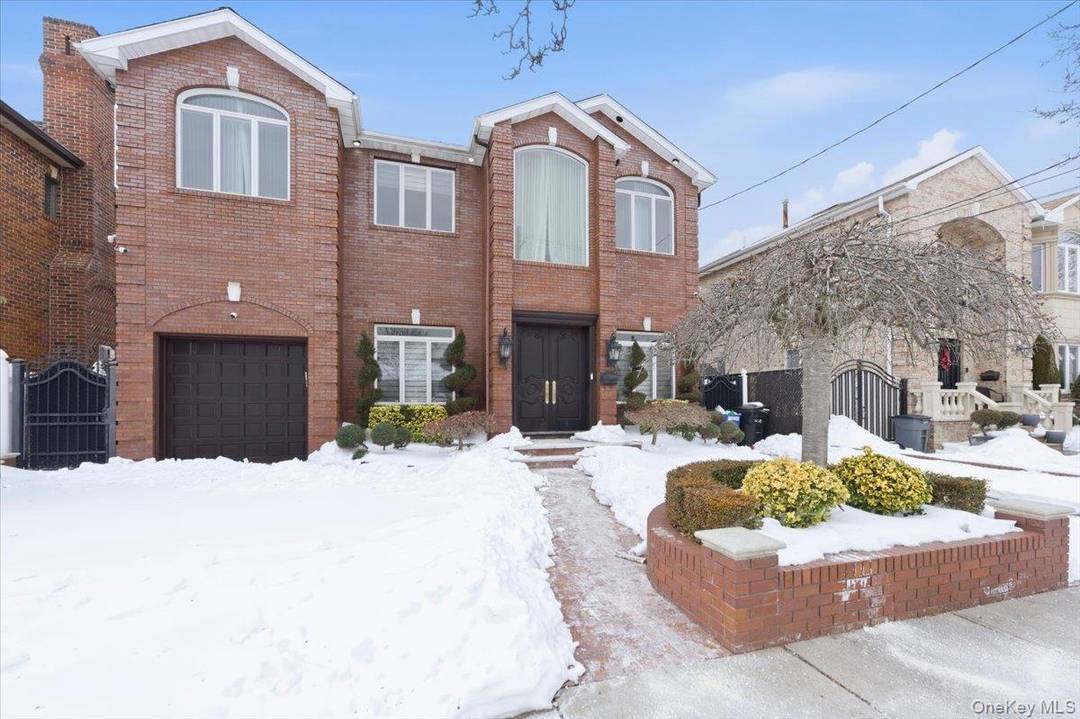 Welcome to this beautifully presented residence in Howard Beach offering generous proportions and refined modern living.