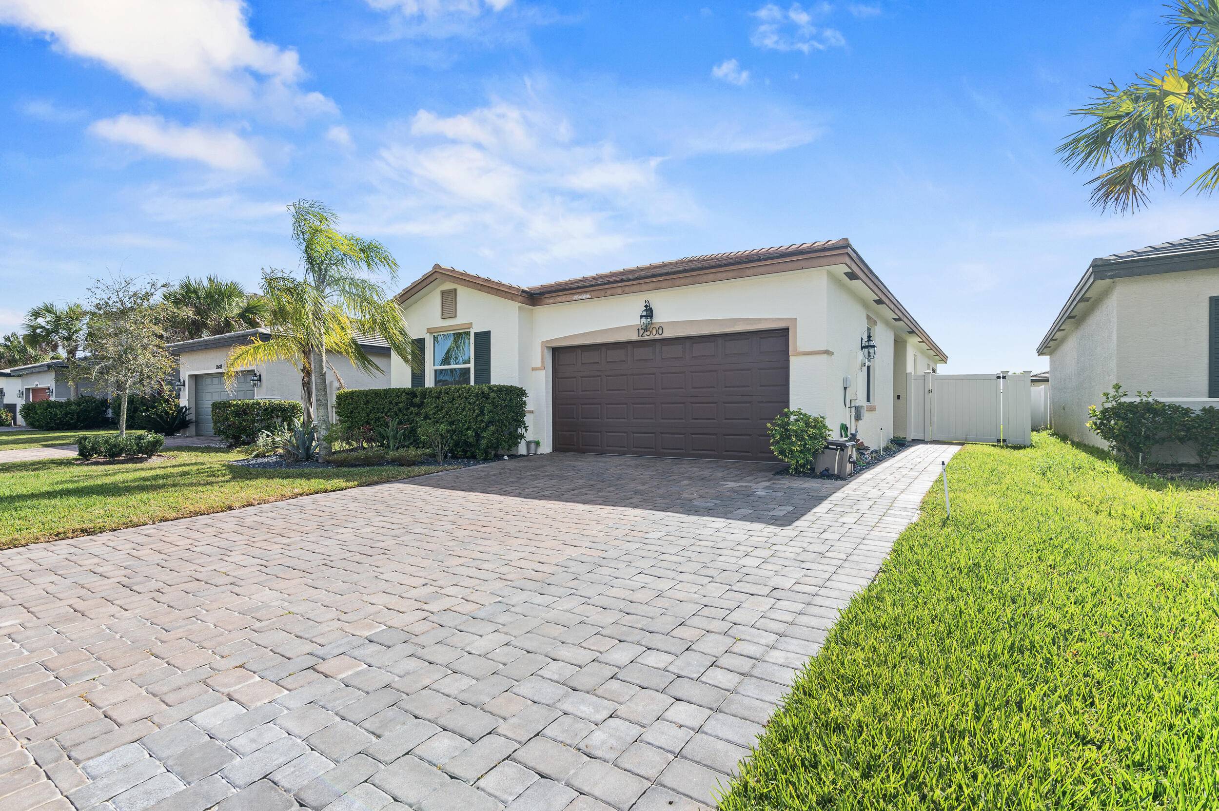Discover this charming 3 bedroom, 2 bathroom home nestled in the desirable Copper Creek gated community of Port Saint Lucie.