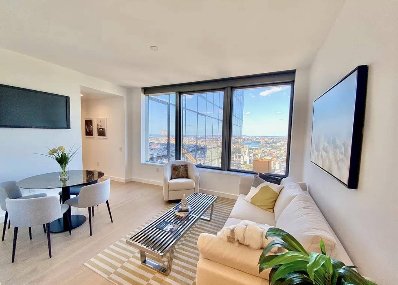 This high floor northeast facing one bedroom is a generously sized residence highlighted by abundant natural light that pours in through the large curtain wall style windows.