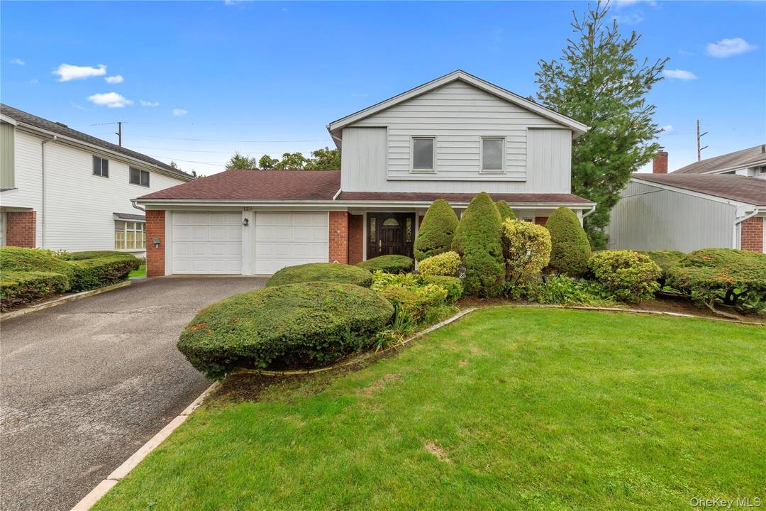 Beautifully Maintained Updated And Spacious Splanch Style Home In Prestigious Manhasset Hills Area With Herricks School District.