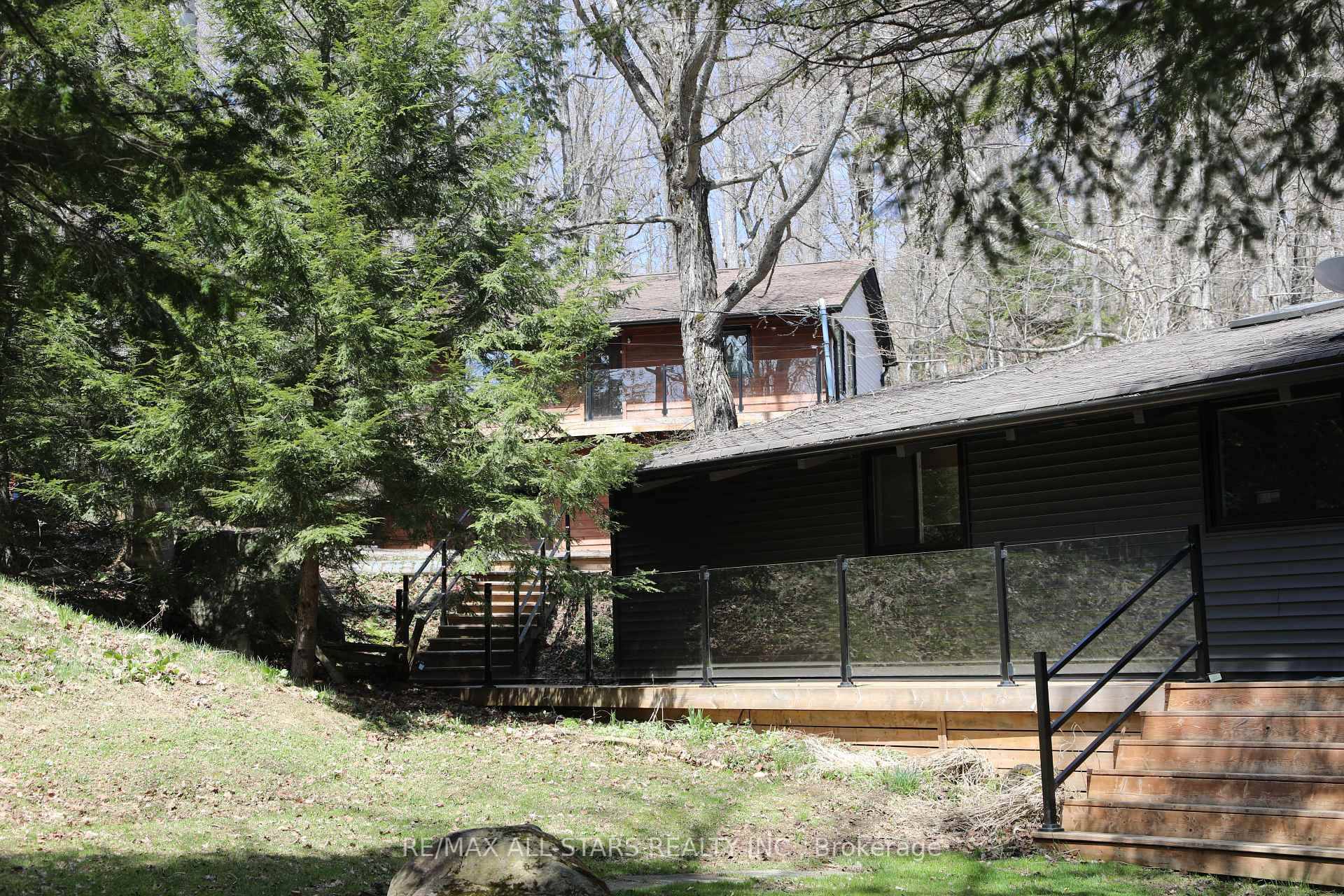 Beautiful family bungalow cottage compound, ideally situated on a municipal road, on beautiful Little Kennisis Lake, perfect for peaceful, private getaways.