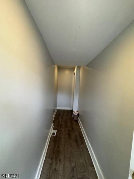 Income producing. Completely renovated 3 family with full finished basement.