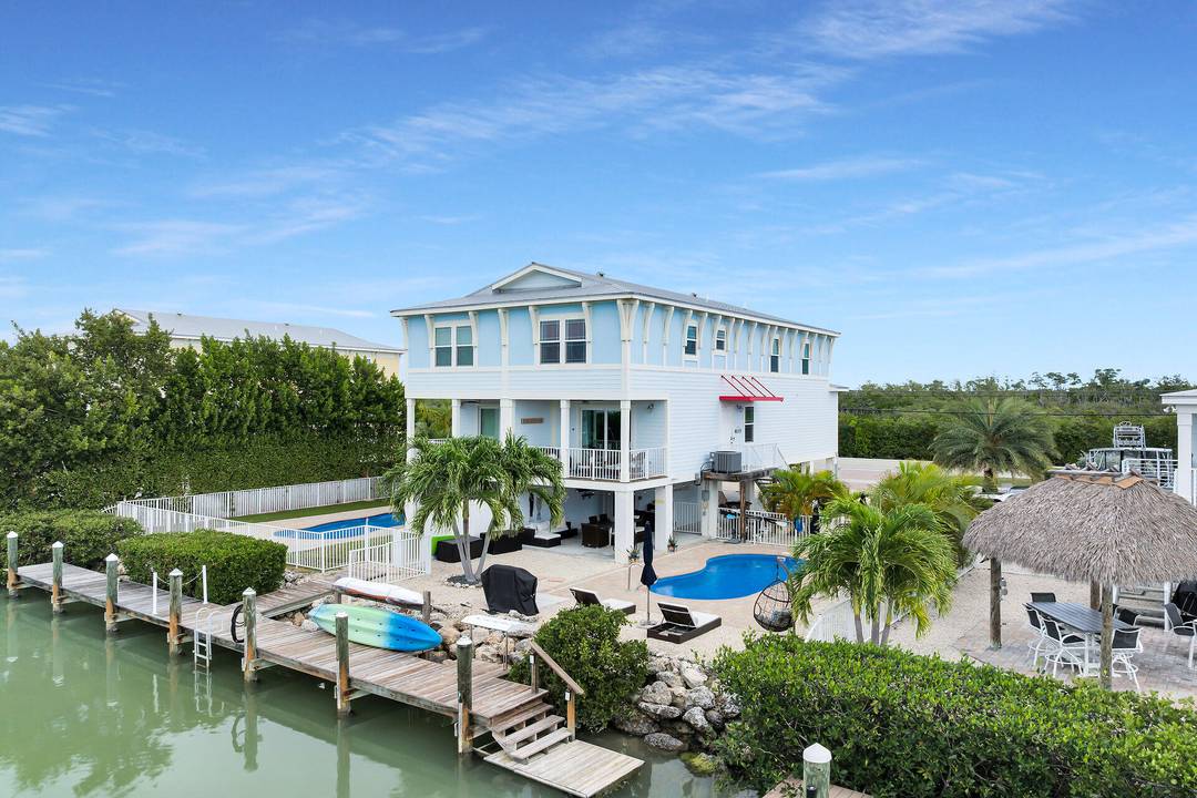 Discover coastal luxury at 219 Sombrero Beach Road 2, a stunning 4 bedroom, 3 bath waterfront retreat just steps from iconic Sombrero Beach, famous for its soft white sand and ...