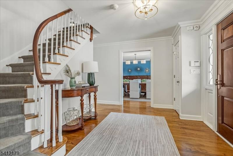 Move in ready Center Hall Colonial in the coveted Woodfield Estates section of Short Hills.