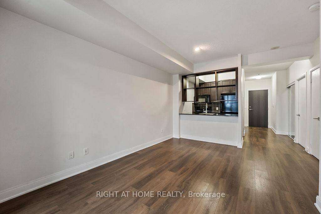 This stunning, spacious 652 sq ft Tridel Solaris II condo offers a bright, open atmosphere with RARE 9' ceilings, a feature that truly sets it apart.