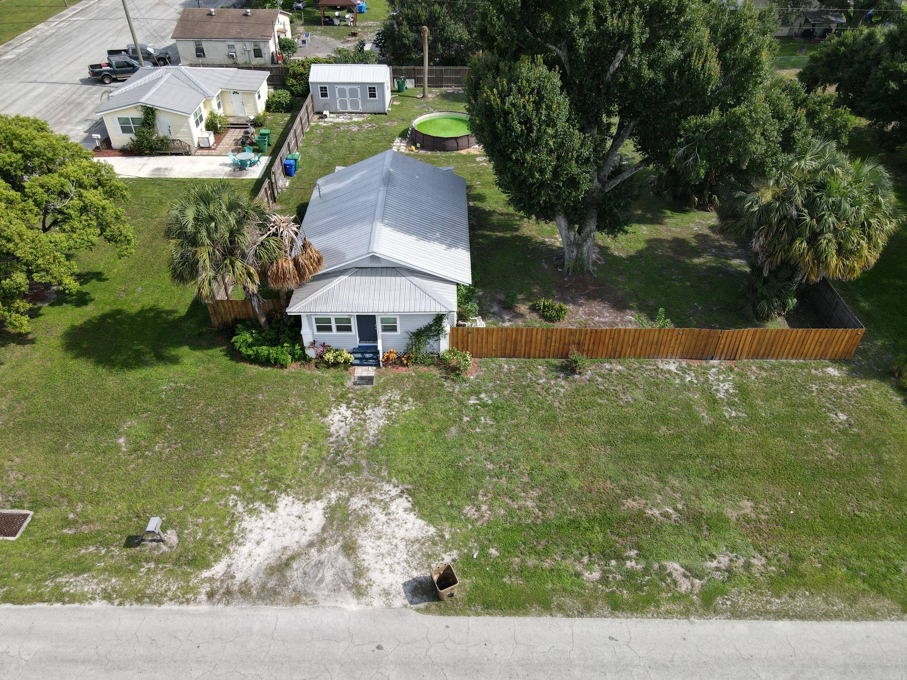 2 Wood frame homes on 1 2 acre in downtown.