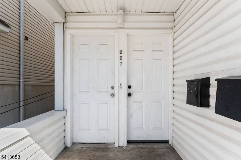 Welcome to this income producing 2 family home in Elizabeth featuring two 4BR 1BA units with renovated kitchens.