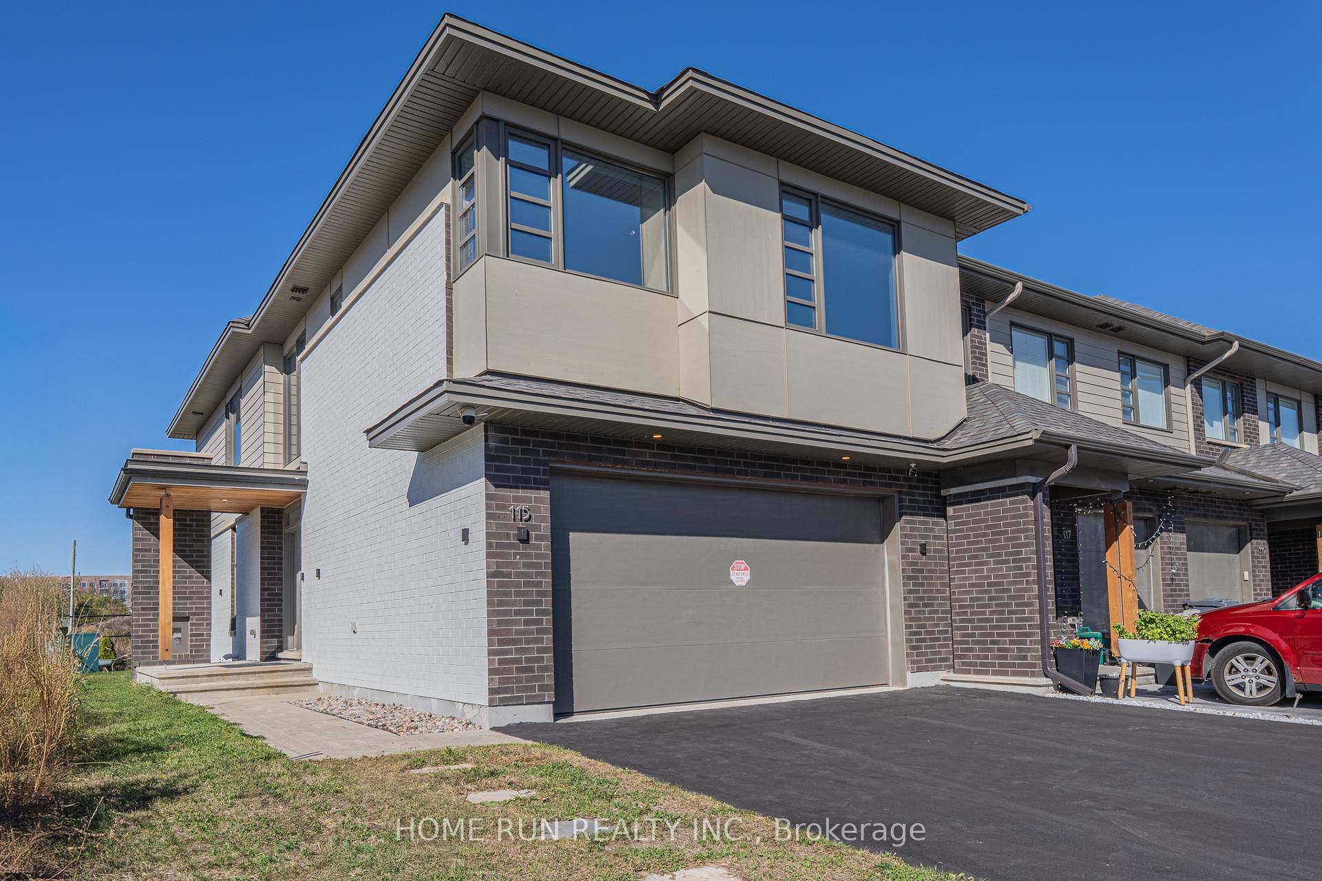 This Beautiful and spacious DOUBLE GARAGE END UNIT townhome offers over 2500 sq.