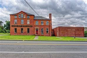 Presenting the historic Gra Rock Bottling Plant also known as the Auction House an iconic property which has a rich history dating back to the 1880s.