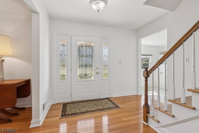 Welcome to this beautifully maintained, move in ready five bedroom, three full bath center hall colonial, set on a large, level lot in one of Hillsborough's most desirable neighborhoods.