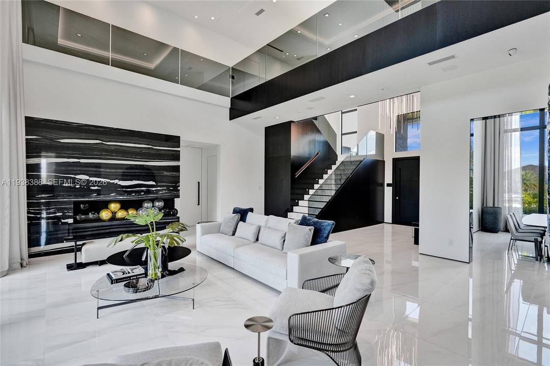 Welcome to a newly construcuted architectural masterpiece by Toll Brothers, located in the prestigious Rolling Oaks community of Southwest Ranches.