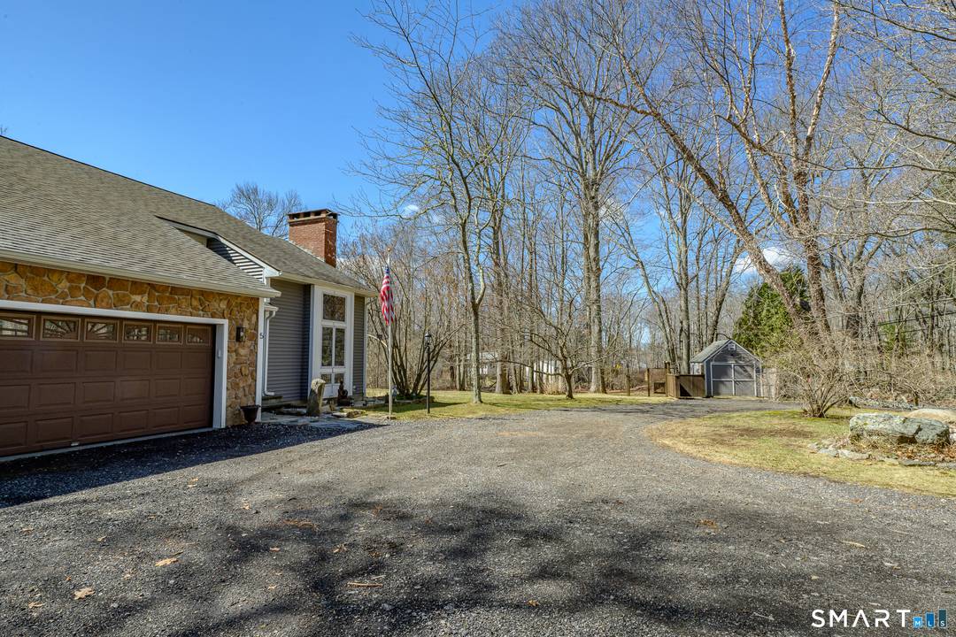 Beautiful 2, 520 sq. ft. contemporary home with vaulted ceilings in the foyer and great room, offering an open yet warm floor plan perfect for entertaining.