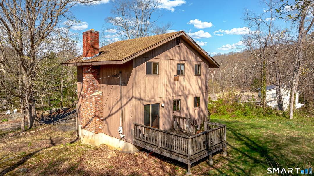 Welcome to 737 Leetes Island Road, a stone's throw from Shell Beach, one of Guilford's most desirable shoreline areas !