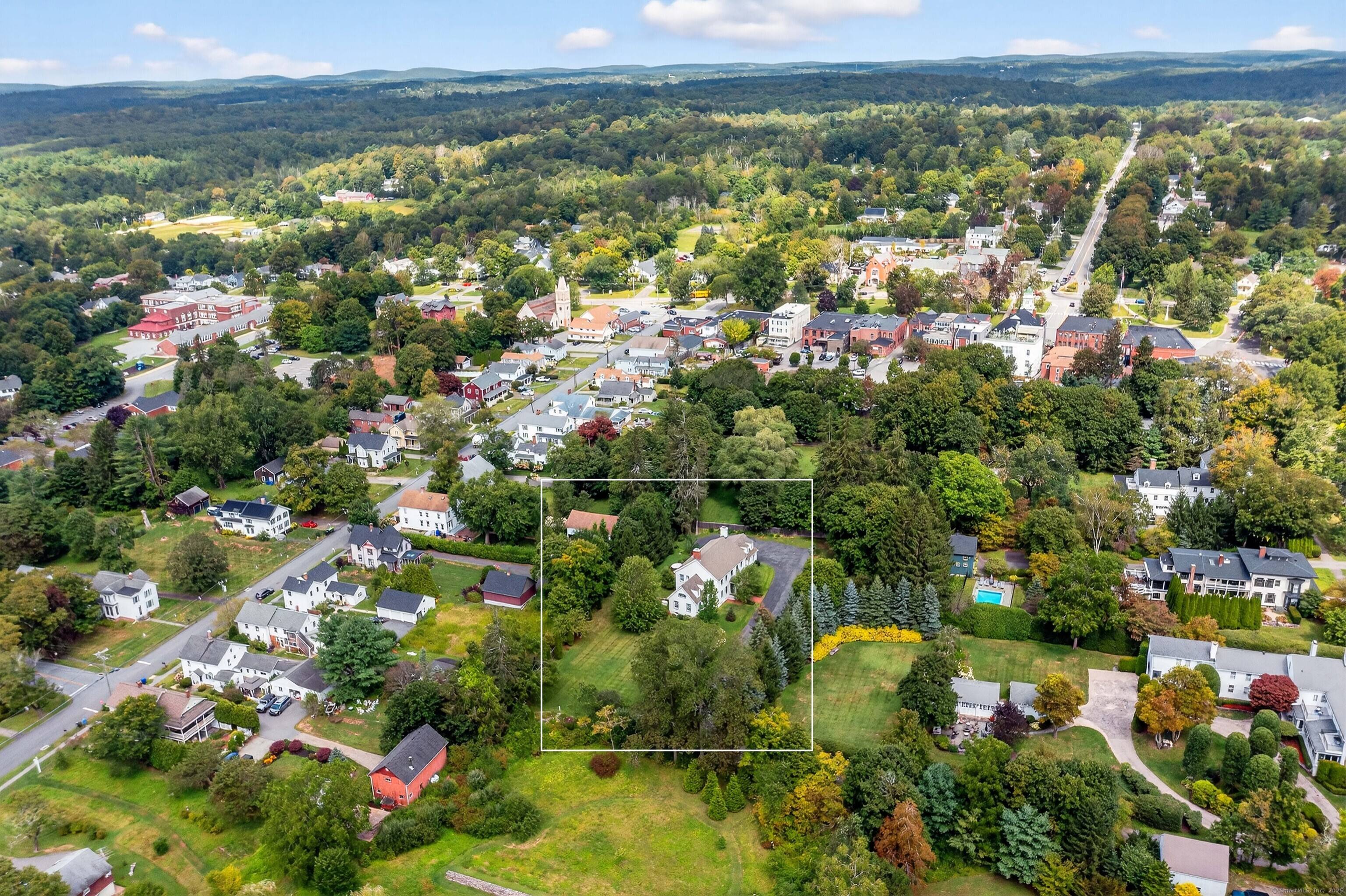 In the heart of historic Litchfield CT, this 2004 colonial sits on a private 1 acre flag lot a short walk to the Green.