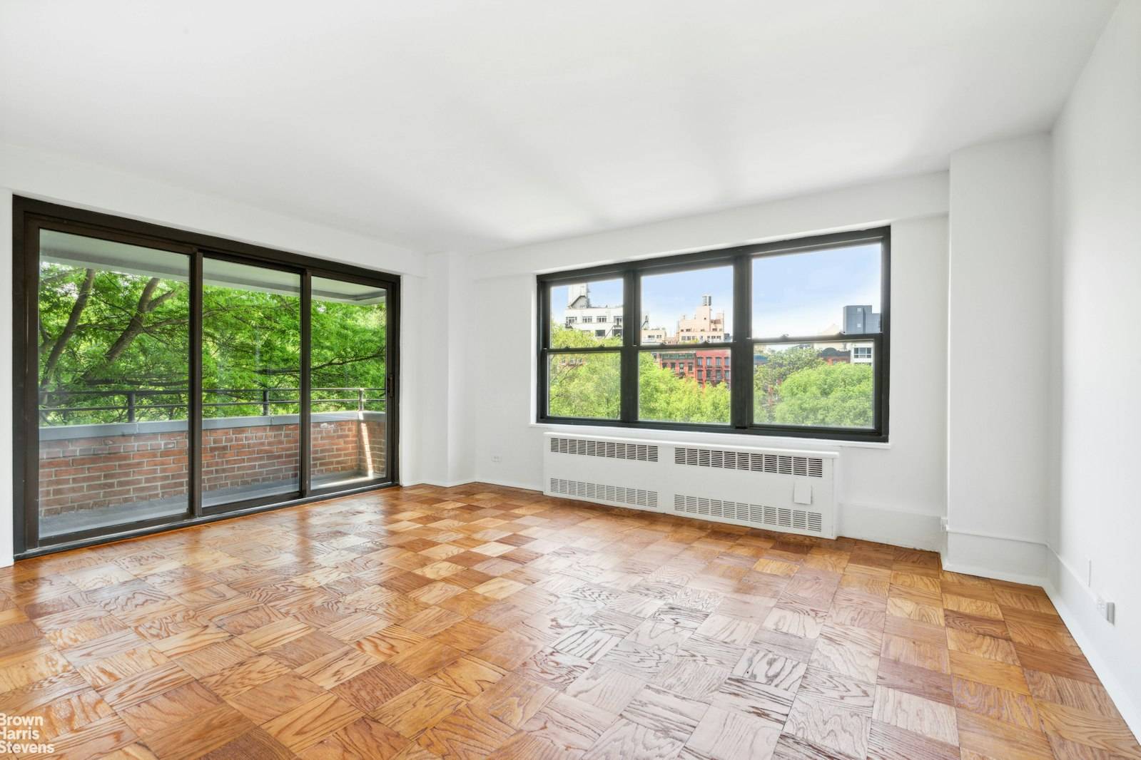 Spacious 2BR Balcony ! Fantastic layout with a wall of west facing windows with treetop views along with sliding glass doors leading to your own private balcony.