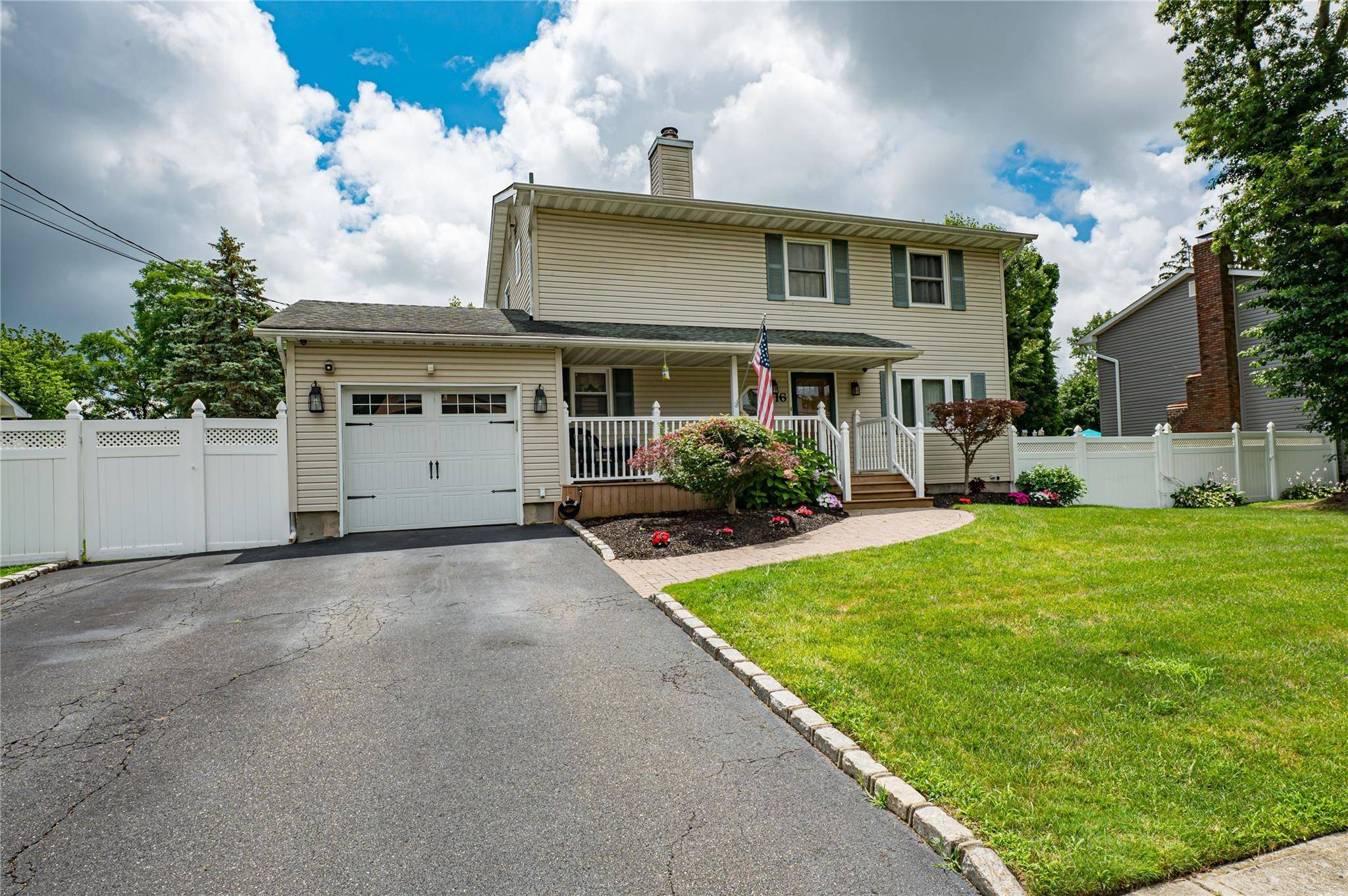 Wonderful Colonial set on manicured park like grounds offers Living Room w Gas Fireplace, Formal Dining Room for entertaining, hardwood floors throughout !