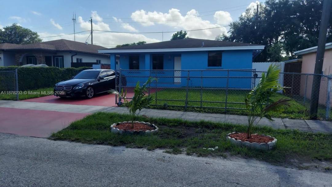 BEAUTIFUL VERY BIG 3 BEDROOM 2 BATHROOM NEW IMPACT WINDOWS, VERY NICE YARD FRONT AND BACK, GATED HOUSE FOR YOUR SAFETY.