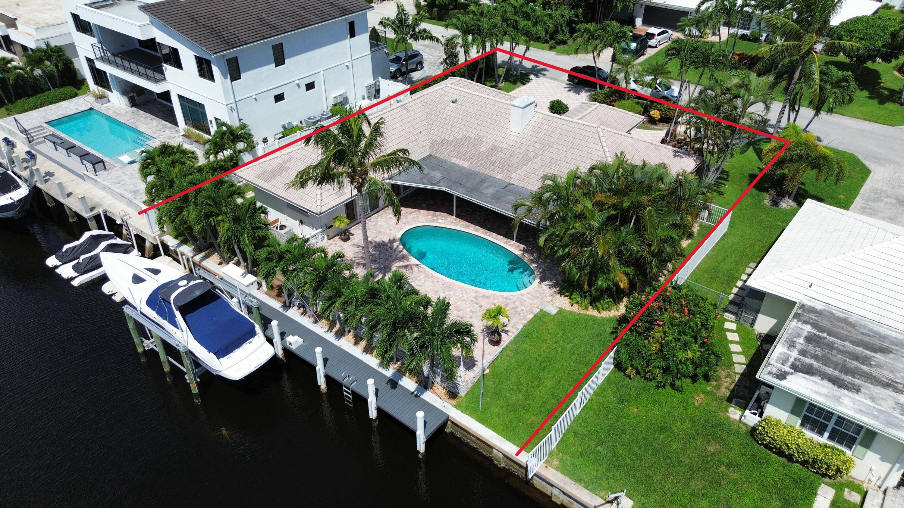Southern exposed deep water home in the prestigious Bel Marra community of East Boca Raton.