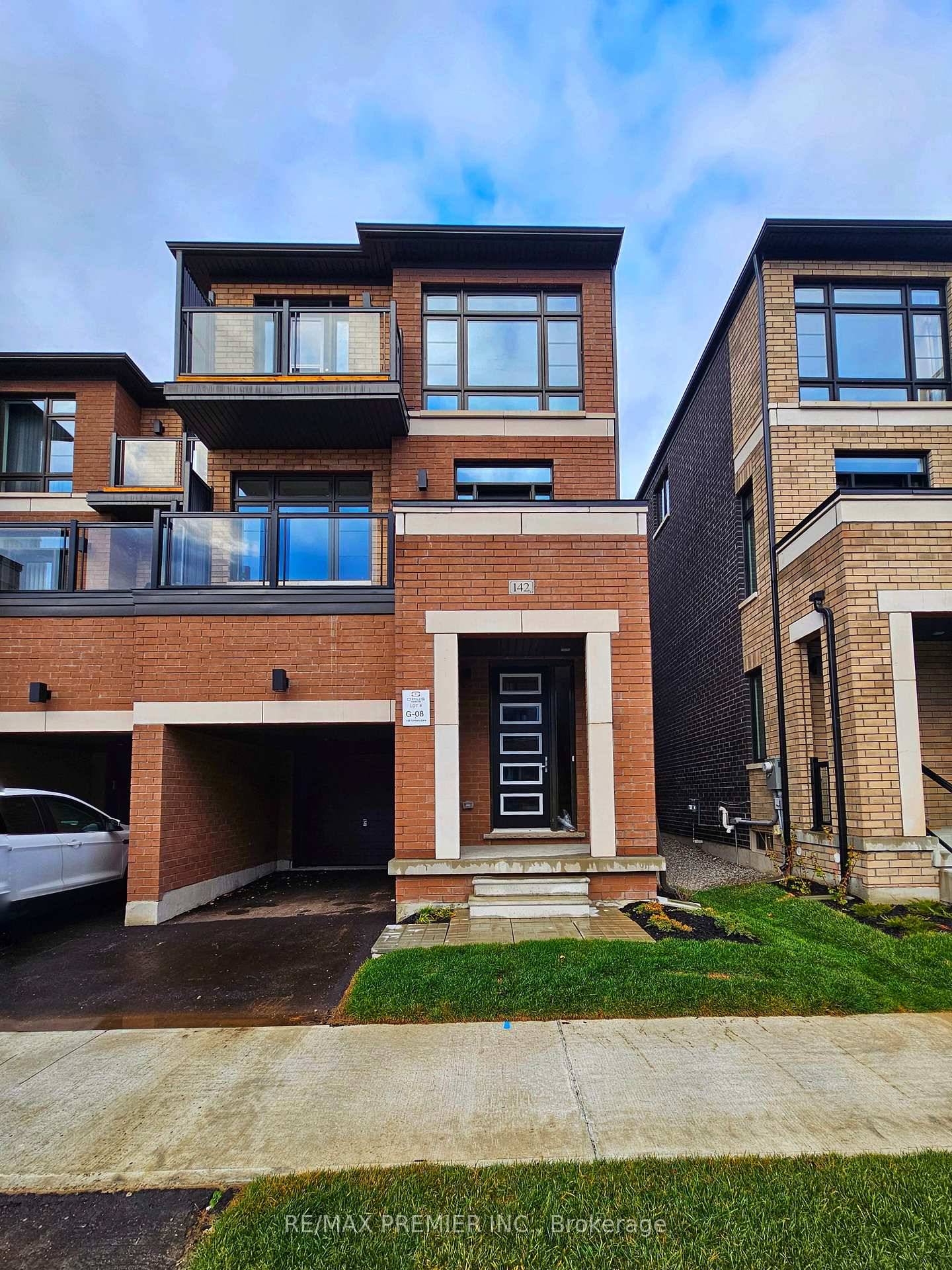 This brand new end unit townhome is offered by 2024 and 2025 home builder of the year OPUS HOMES who feature all brick and stone exteriors !