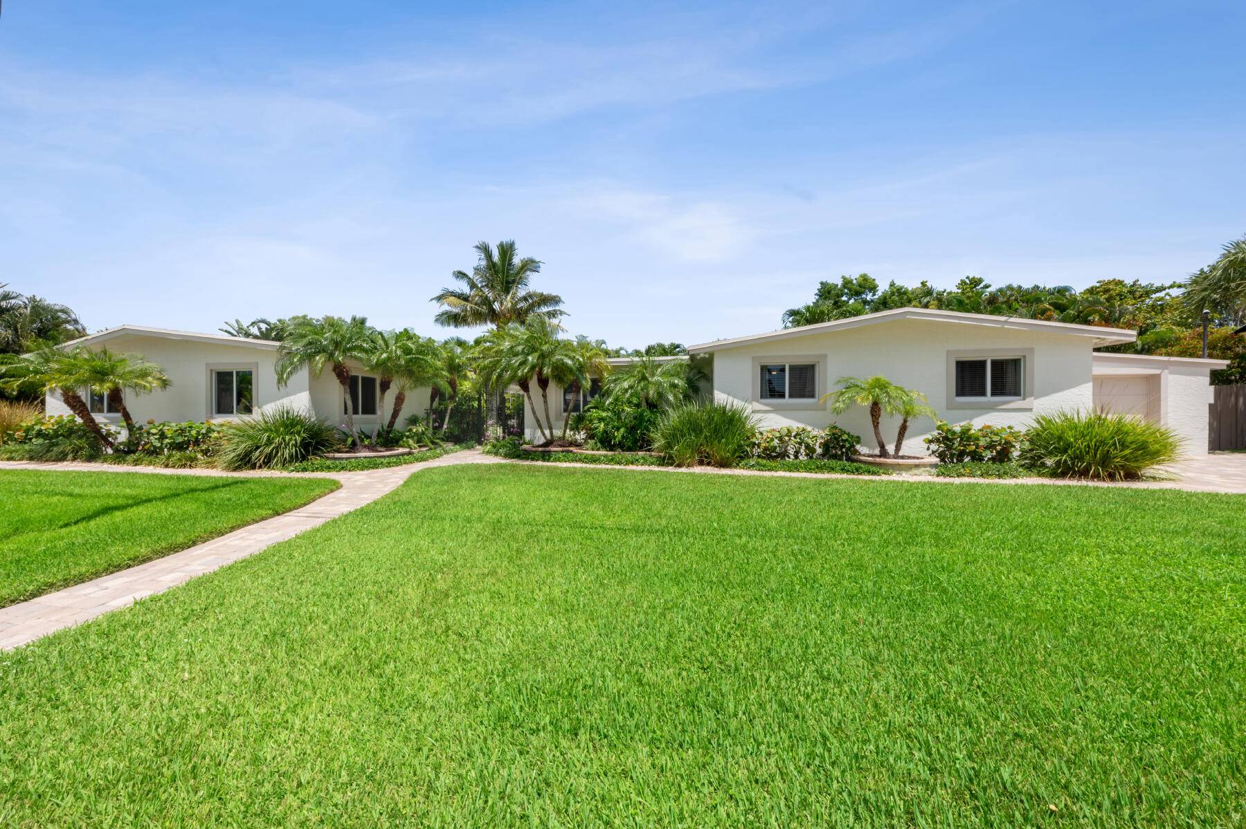 Boater's paradise and coastal living come together in this rare Hypoluxo offering two homes on a double lot in this intracoastal community with a private pool, and deeded boat slip ...