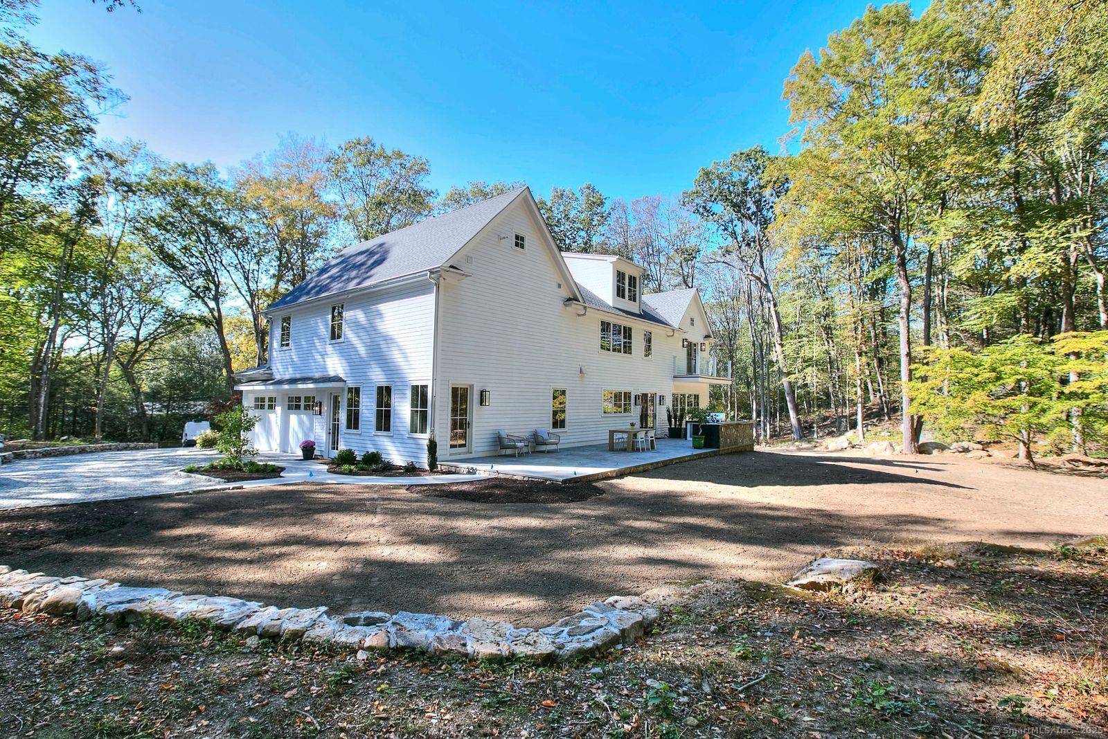 Welcome to 199 Mariomi road, a modern farmhouse set on 2 acres.