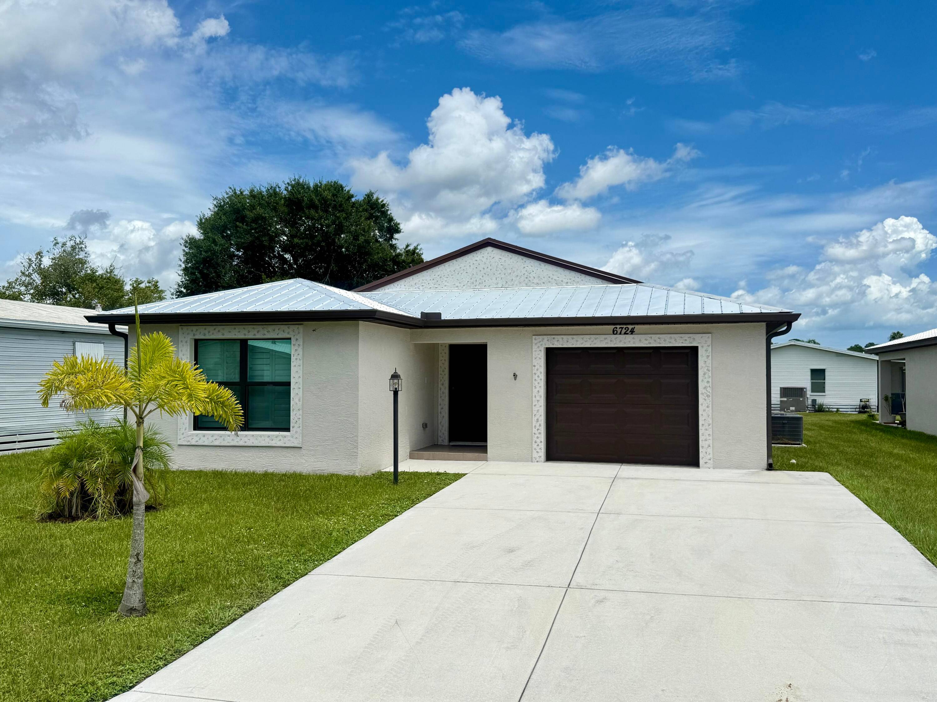 Rare to find new CBS home with many upgrades, Metal Roof, Bright Split floor plan, high ceilings, 2 Master suite bedrooms each with private bathroom, granite counter, dual sink vanities.