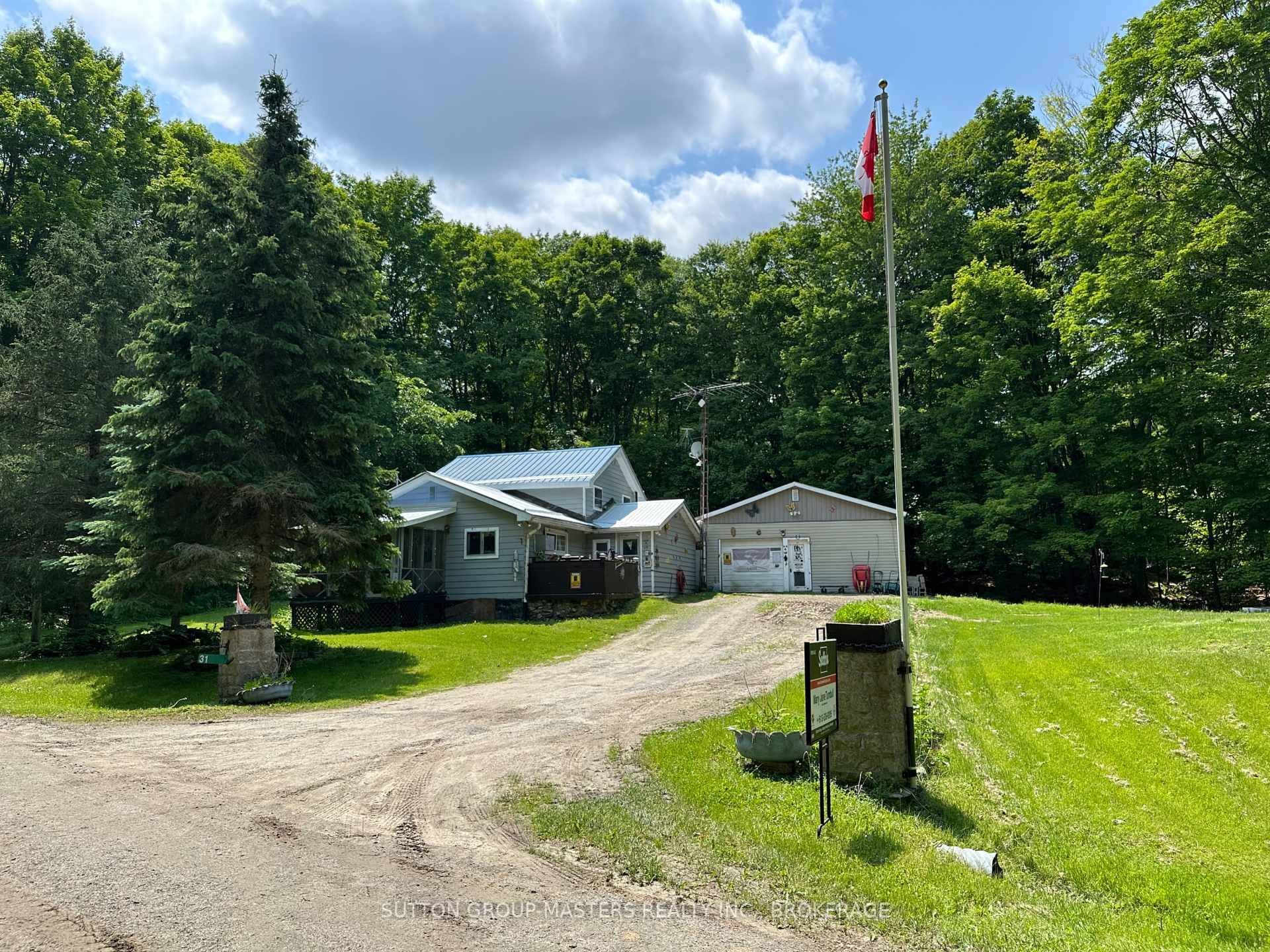 Looking for affordable privacy on a quiet road with a 2 car garage ?