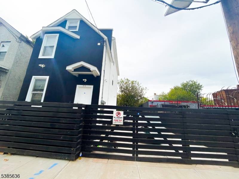 Welcome to this fully renovated two family home set on an oversized double lot, designed for modern living and complete with a spaciously paved yard and parking for up to ...