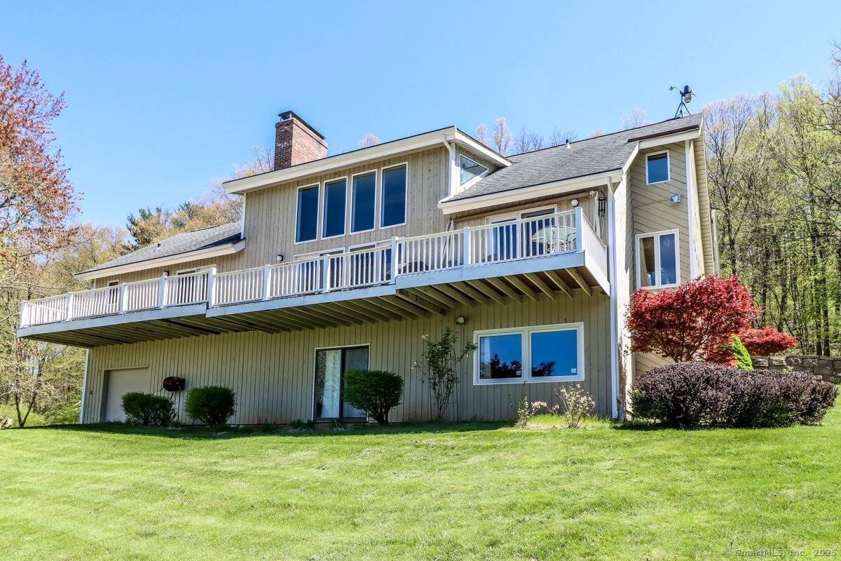 Large unique and custom 5 bedroom Contemporary with Forever Views and open layout !