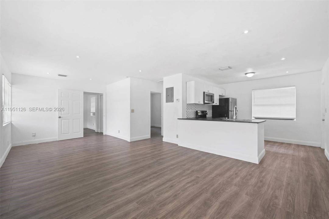 Fully renovated duplex on a corner lot featuring a new roof installed in 2022, three year old A C units, and a high quality fence installed in 2025.