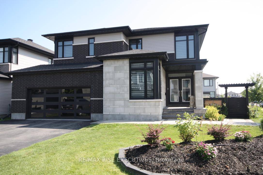 Sitting on a fully fenced premium corner lot, this bright modern 2 storey home has 9' ceilings on the main floor and in the basement.
