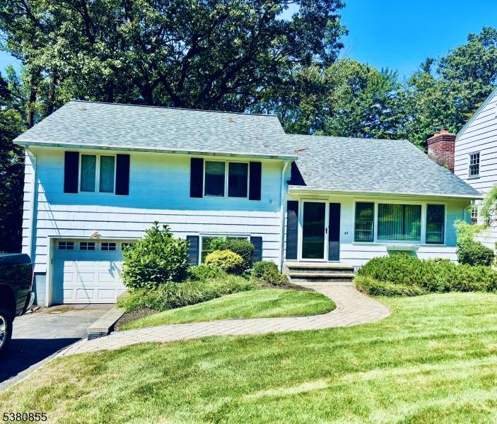 St. Cloud Living ! Tucked away on a quiet, tree lined cul de sac in West Orange's sought after St.