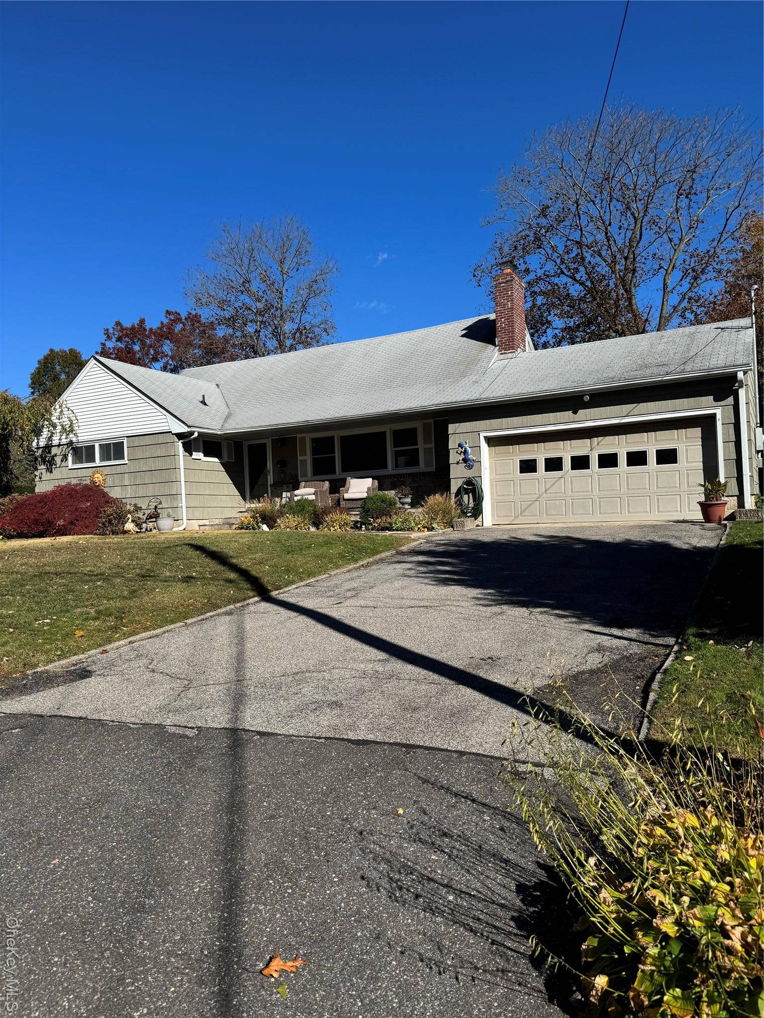 This expanded Ranch offers the perfect blend of comfort, style, and location just moments from the Harbor, Marina, Village, bus, and Long Island Railroad.