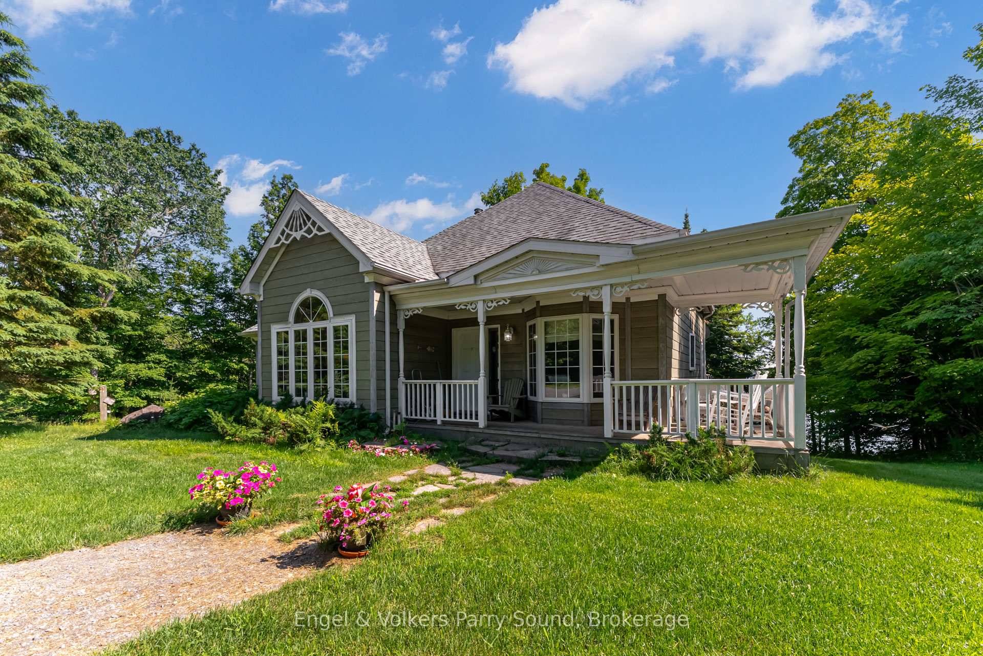 Welcome to 37 Lizzie's Lane, an executive lake house on the pristine shores of Lake Manitouwabing.