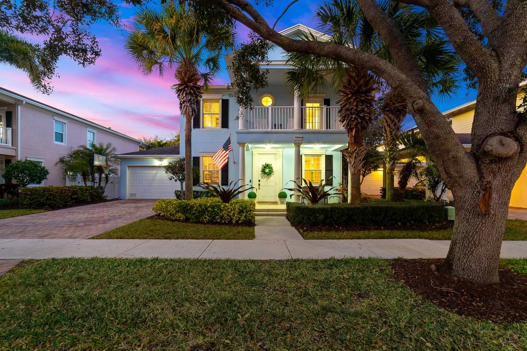 Welcome to this exquisite five bedroom, three and a half bathroom residence nestled in the heart of Martinique, one of Jupiter's most sought after communities.
