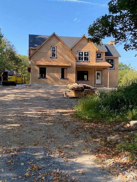 New construction colonial on a beautiful 9 acre lot with views of the Shawangunk Mountain Ridge, a spring fed pond and open fields and woods located on a private dead ...