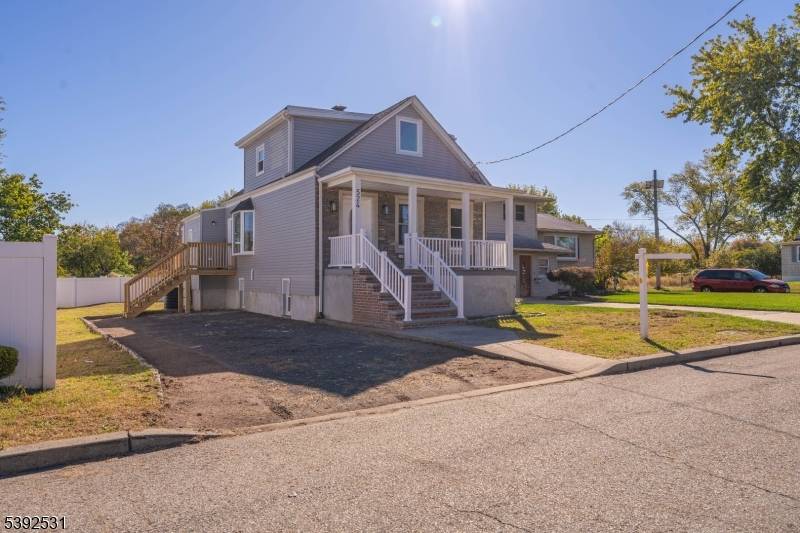 Welcome to this beautifully fully renovated 4 bedroom, 3 bath home in the heart of Woodbridge Township !