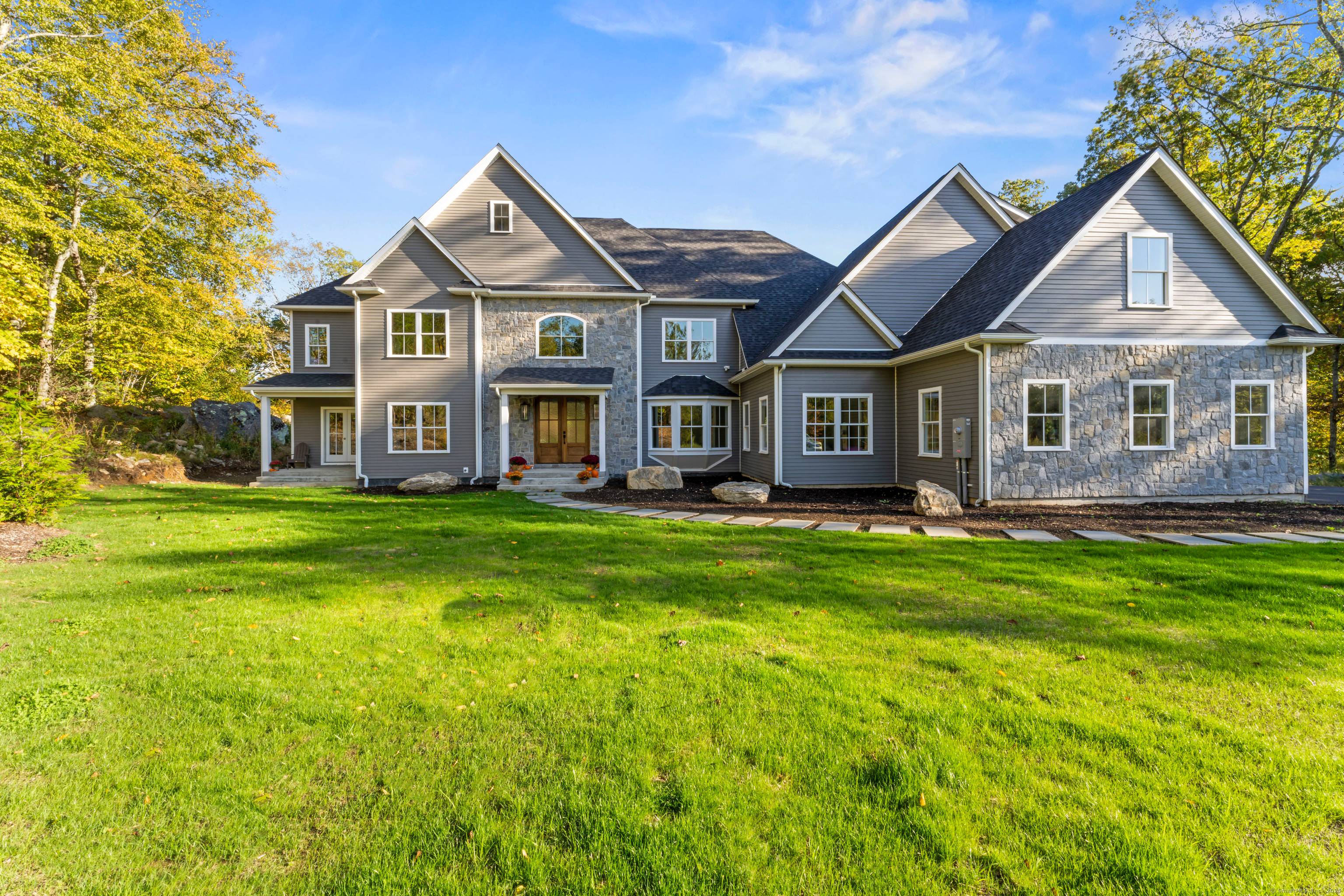 Welcome home to 5 Vona Way, where elegance meets comfort in this exceptional Colonial retreat.