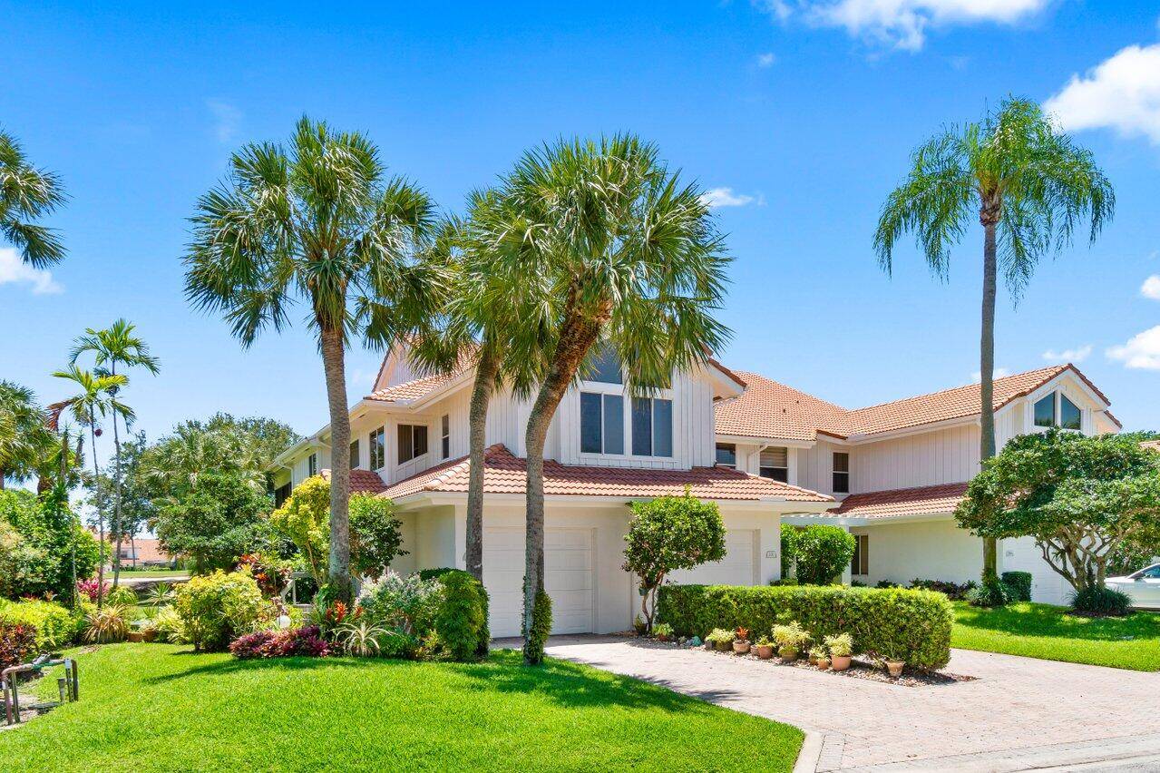 Experience luxury living in this top floor penthouse condo in the prestigious Broken Sound Country Club.