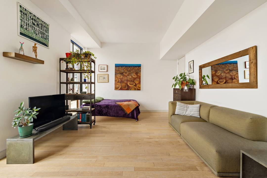 Rarely available penthouse condominium with private balcony and expansive city views Perched atop The Industry as Penthouse A, this sun drenched studio easily convertible to a junior one bedroom makes ...