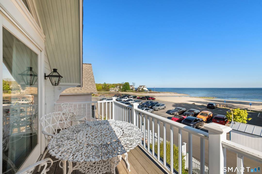Stunning Waterfront Retreat with Four Decks, Private Yard Breathtaking Views !