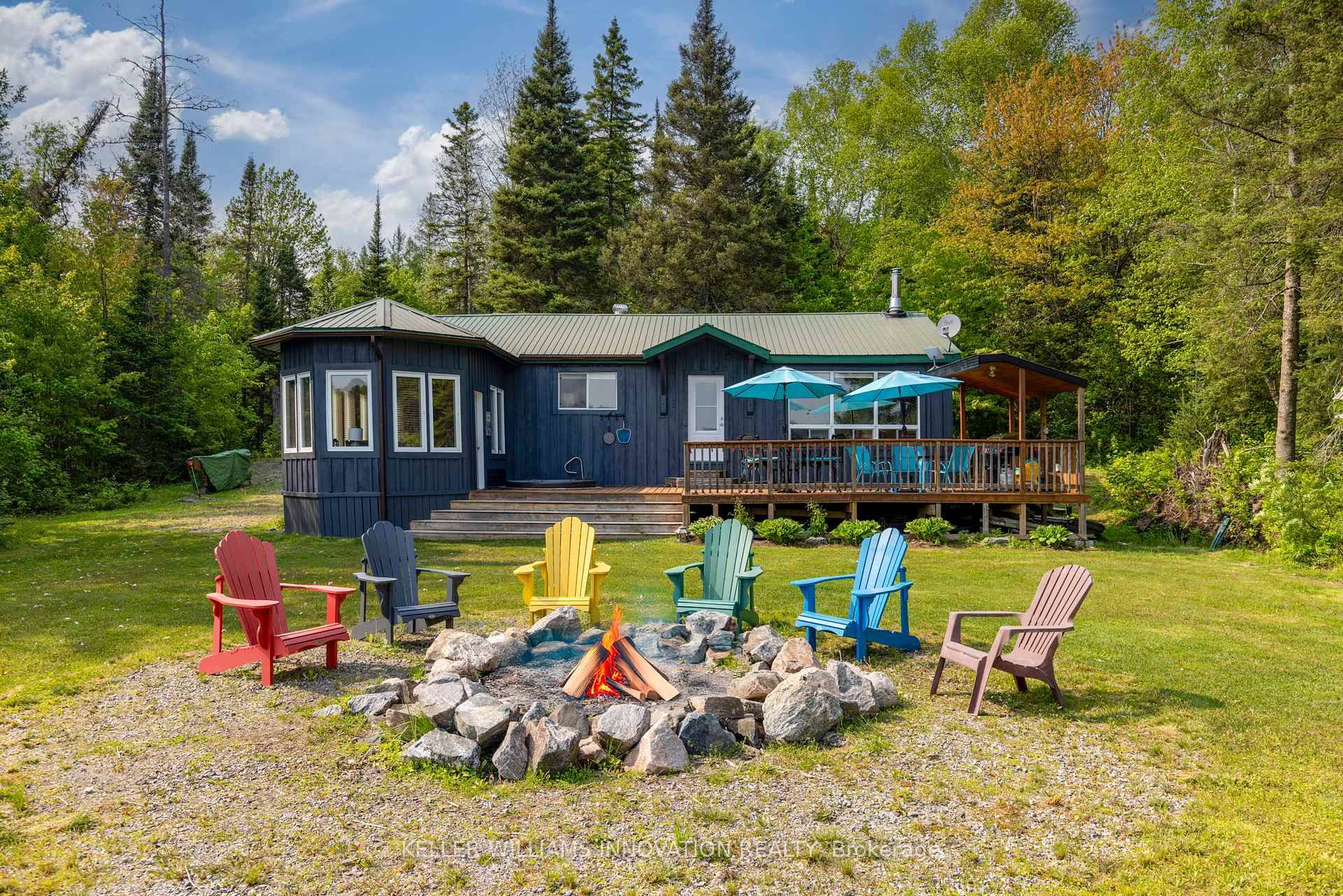 Tucked down a quiet lane on the shores of Deer Lake, this charming cottage sits on nearly an acre of level, sun filled land with a beach shoreline ideal for ...