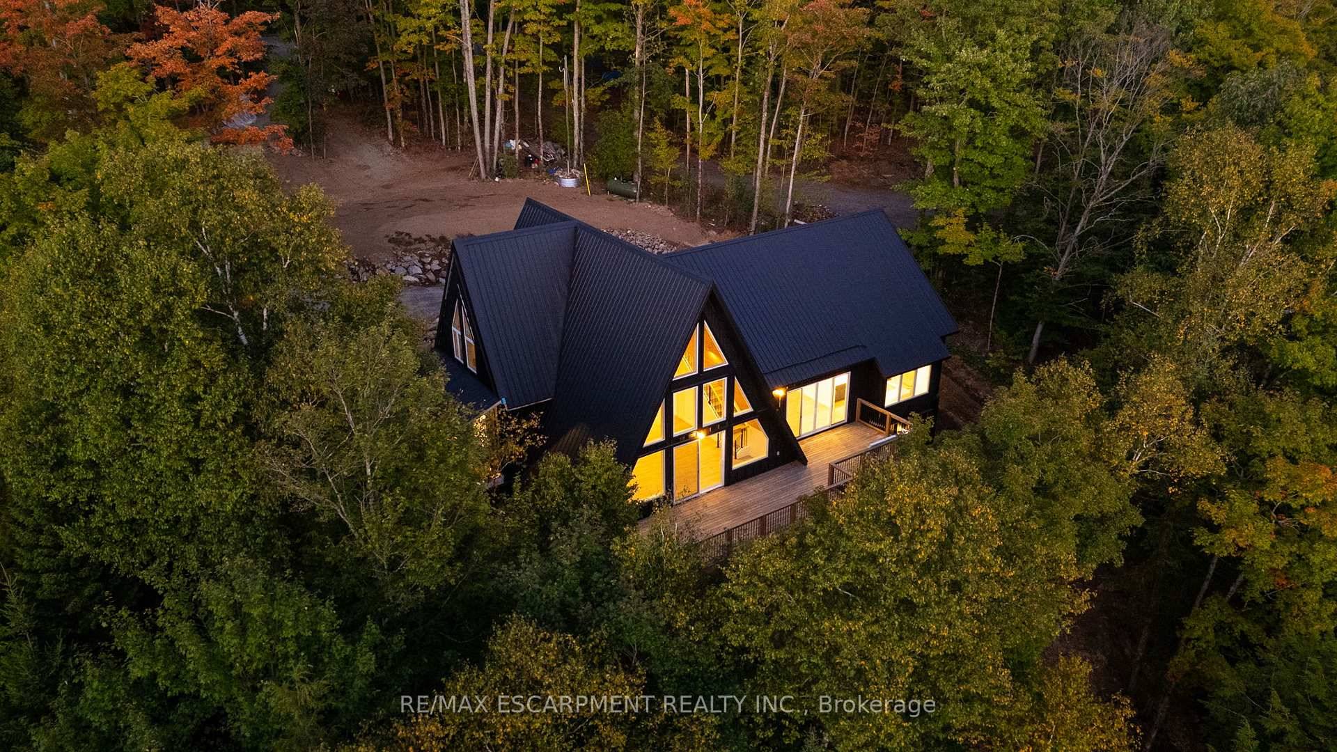 Rare opportunity to own a custom 3 bedroom, 2 bath A frame modern hybrid lakefront retreat on spring fed Wenona Lake where thoughtful design amp ; exceptional craftsmanship meet Haliburton's ...