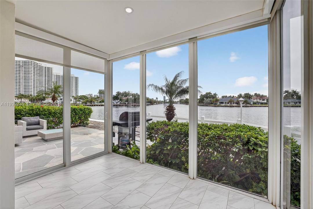 Price Drop ! A rare waterfront gem tucked inside one of Hallandale's most hidden, coveted enclaves on Ocean Drive a one of a kind ground floor corner unit delivers privacy, ...