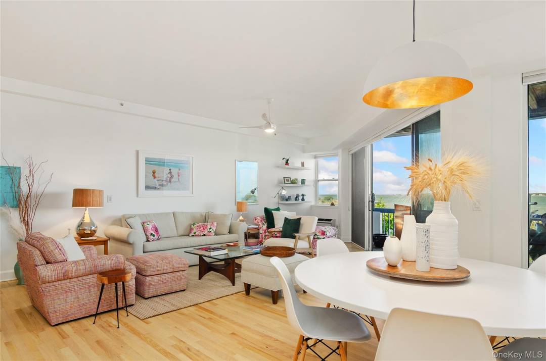 Spend your August soaking up the sun and sunsets in this stunning, fully renovated bayfront condo located in the Yardarm community of Westhampton Beach Village.