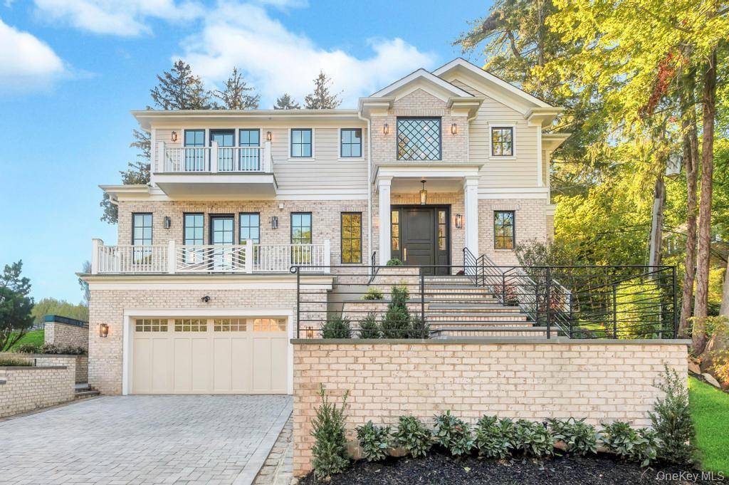 Stunning New Construction Residence In A Prime Location, Blending Timeless Elegance With Modern Comfort.