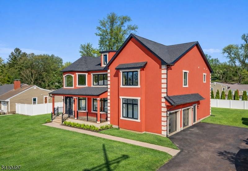 Stunning New Construction in the Desirable Lionshead Lake Section of Wayne !